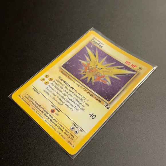 Pokémon Zappos holographic fossil card.